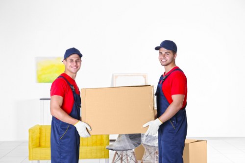 Removal boxes and wrapped household goods ready for delivery
