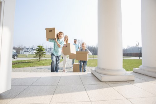 Removal van and packed boxes for a Westminster flat move