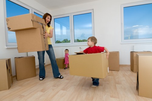 Packed boxes and furniture prepared for a Westminster moving van service