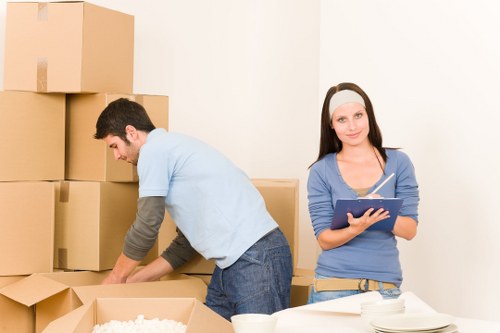 Boxes and furniture prepared for a Westminster home removal