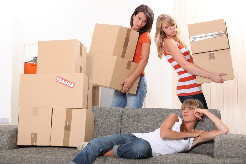 Unpacking boxes in a central London apartment in Westminster