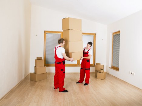 Household belongings being unloaded at a Westminster property